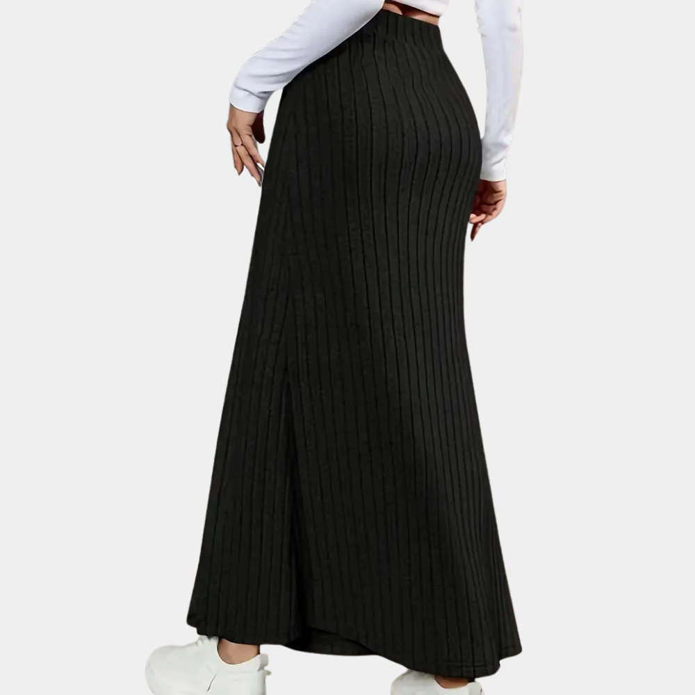 Chic fitted long skirt for women, featuring a sophisticated side slit and stylish button detail.