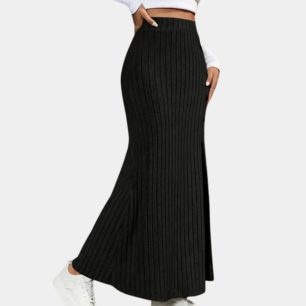 Fashionable women's long fitted skirt with a graceful side slit, enhancing any outfit.