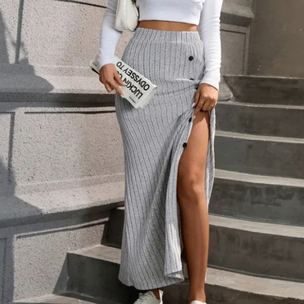 Stylish women's fitted maxi skirt, offering a sleek silhouette and a chic side slit detail.