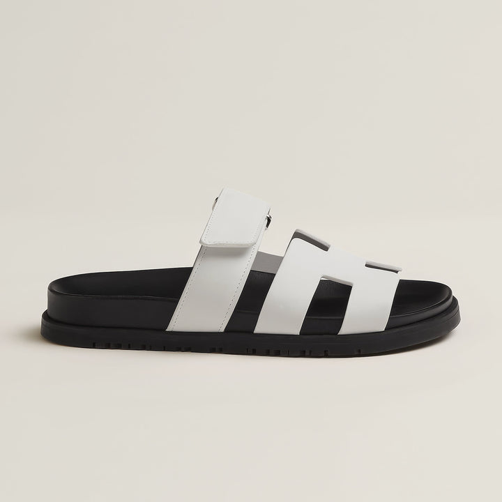 Chic flat slip-on sandals for women, comfortable and versatile everyday wear.