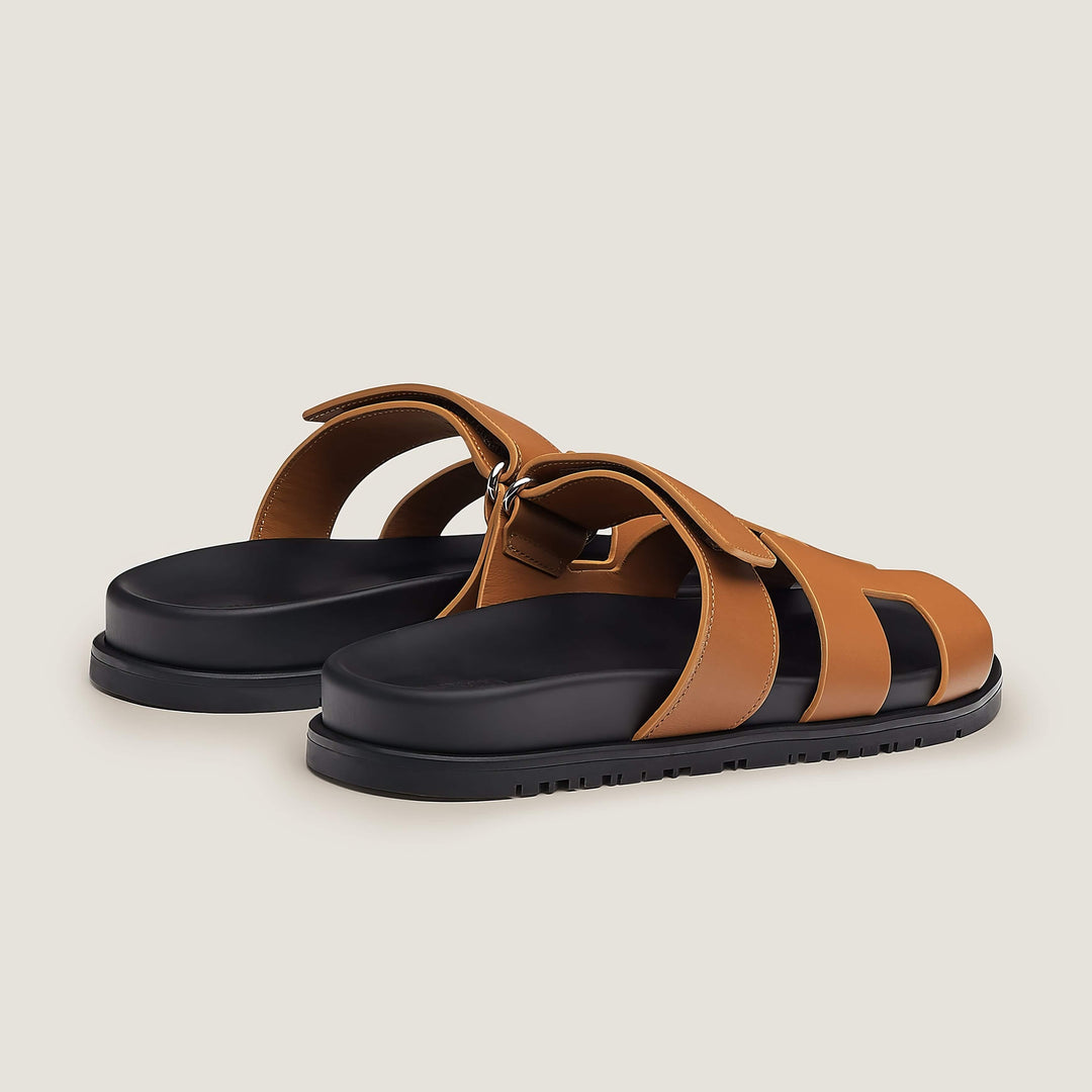 Comfortable flat slip-on women's sandals, versatile for daily casual wear.
