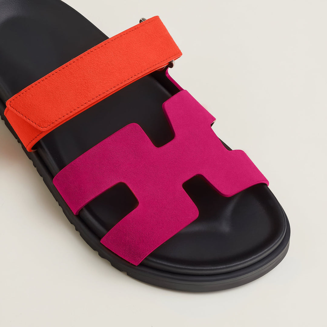 Stylish women's flat sandals, slip-on for versatile and comfortable summer wear.
