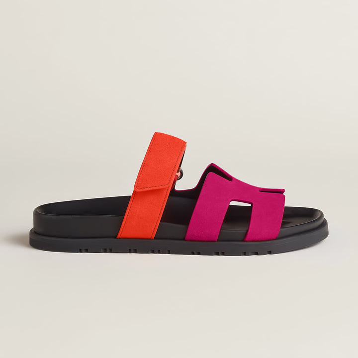 Modern women's slip-on flat sandals, perfect for effortless casual summer style.