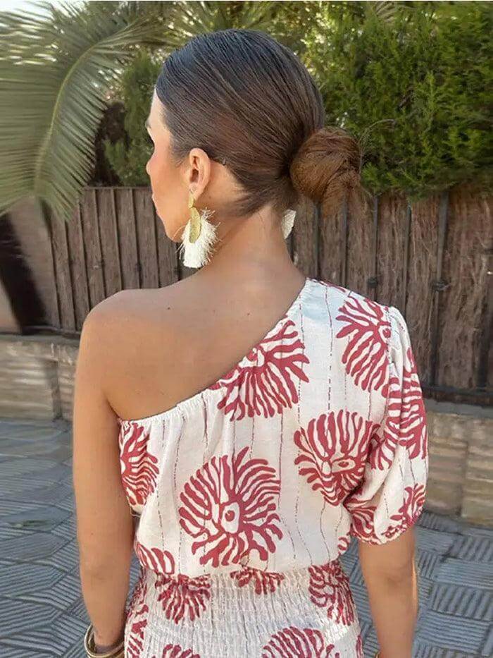 Comfortable women's knitted dress featuring a unique asymmetrical waistline. Modern fashion apparel.