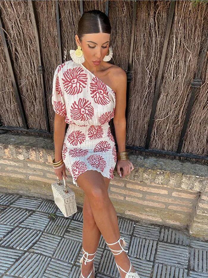 Flattering women's elegant asymmetrical knitted dress. A versatile piece for a modern wardrobe.