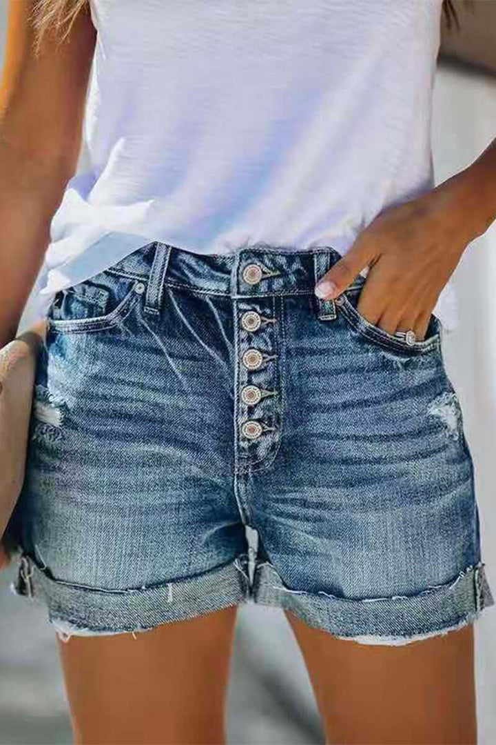 Women's flattering mid-rise blue denim shorts, perfect for comfortable summer casual wear.