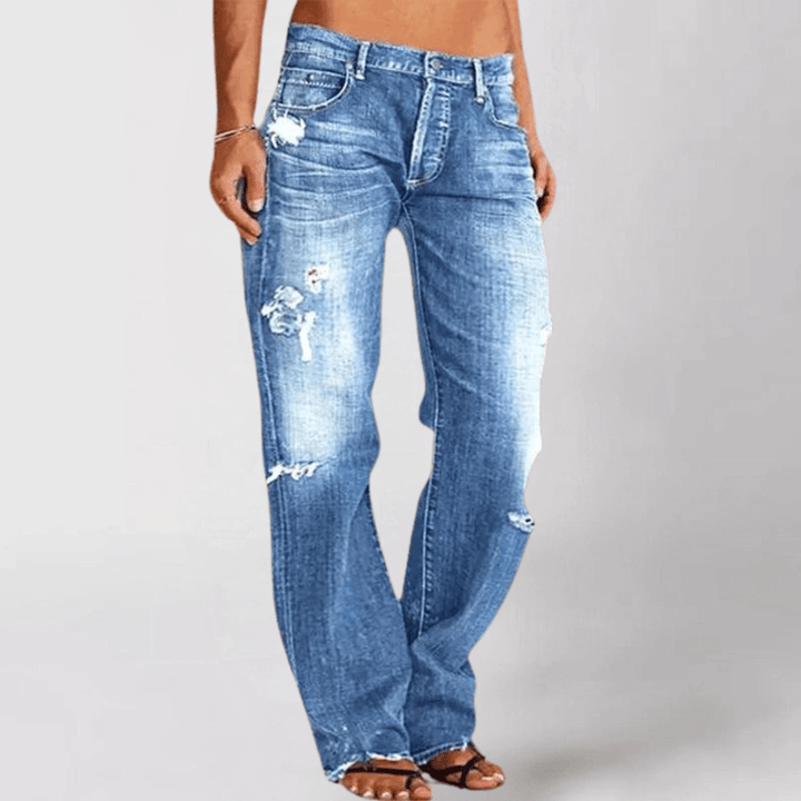 Women's flattering mid-rise stretch bootcut jeans. Everyday denim for comfort and style.