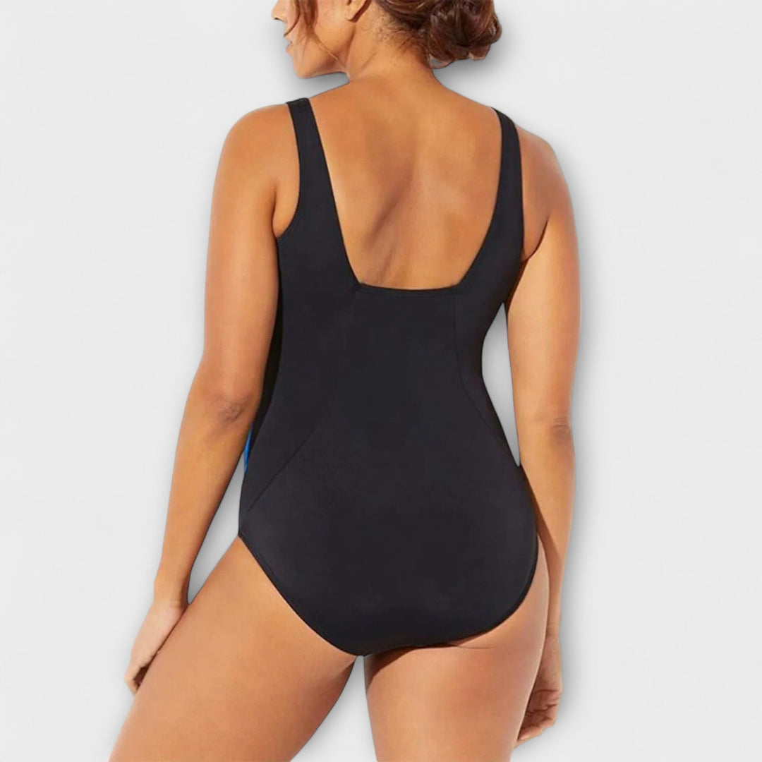 Stylish women's one-piece swimsuit for vacation essentials. Flattering design, ideal for beach & poolside fashion.