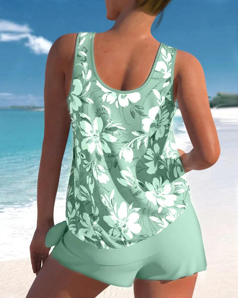 Elegant women's v-neck tankini top and boyshorts, a perfect two-piece beachwear set for summer.