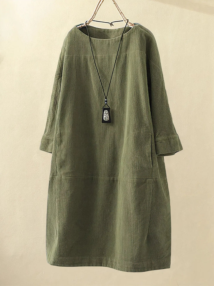 Women's flattering tummy covering midi dress, perfect for comfortable spring/summer style.