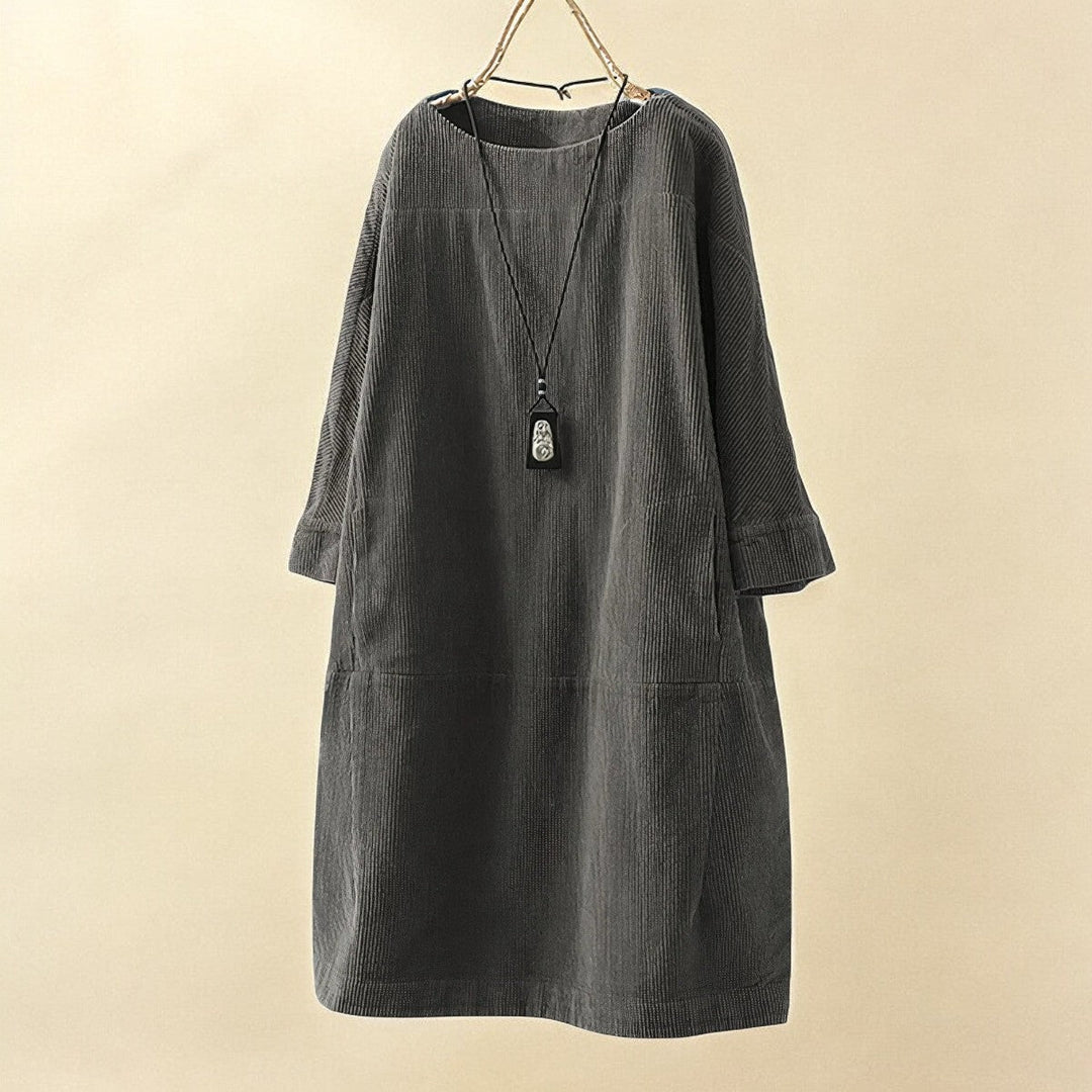 Women's flattering everyday dress, comfortable with tummy coverage for a stylish look.