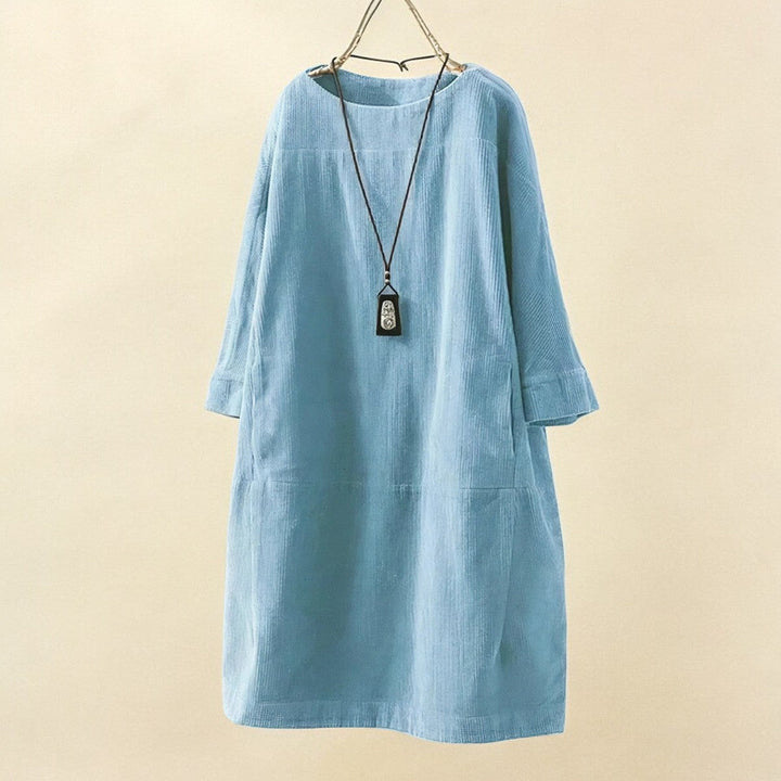 Elegant flowy midi dress for women, offering comfortable tummy coverage for everyday wear.