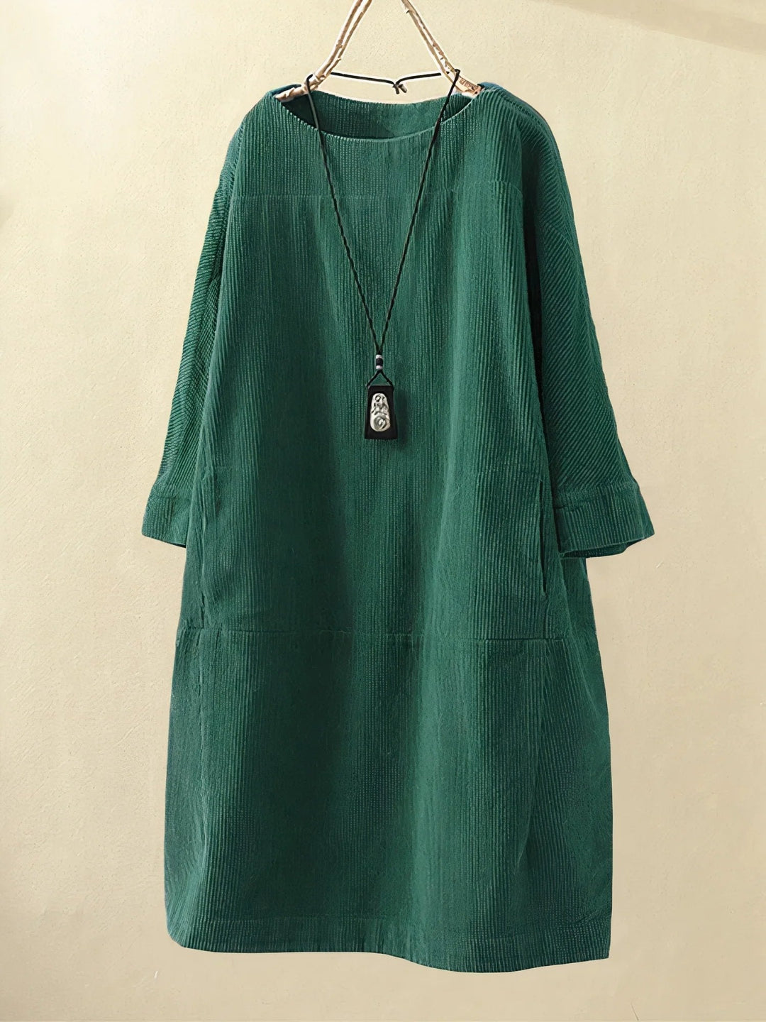 Spring/summer midi dress for women, providing flattering tummy coverage & a flowy silhouette.