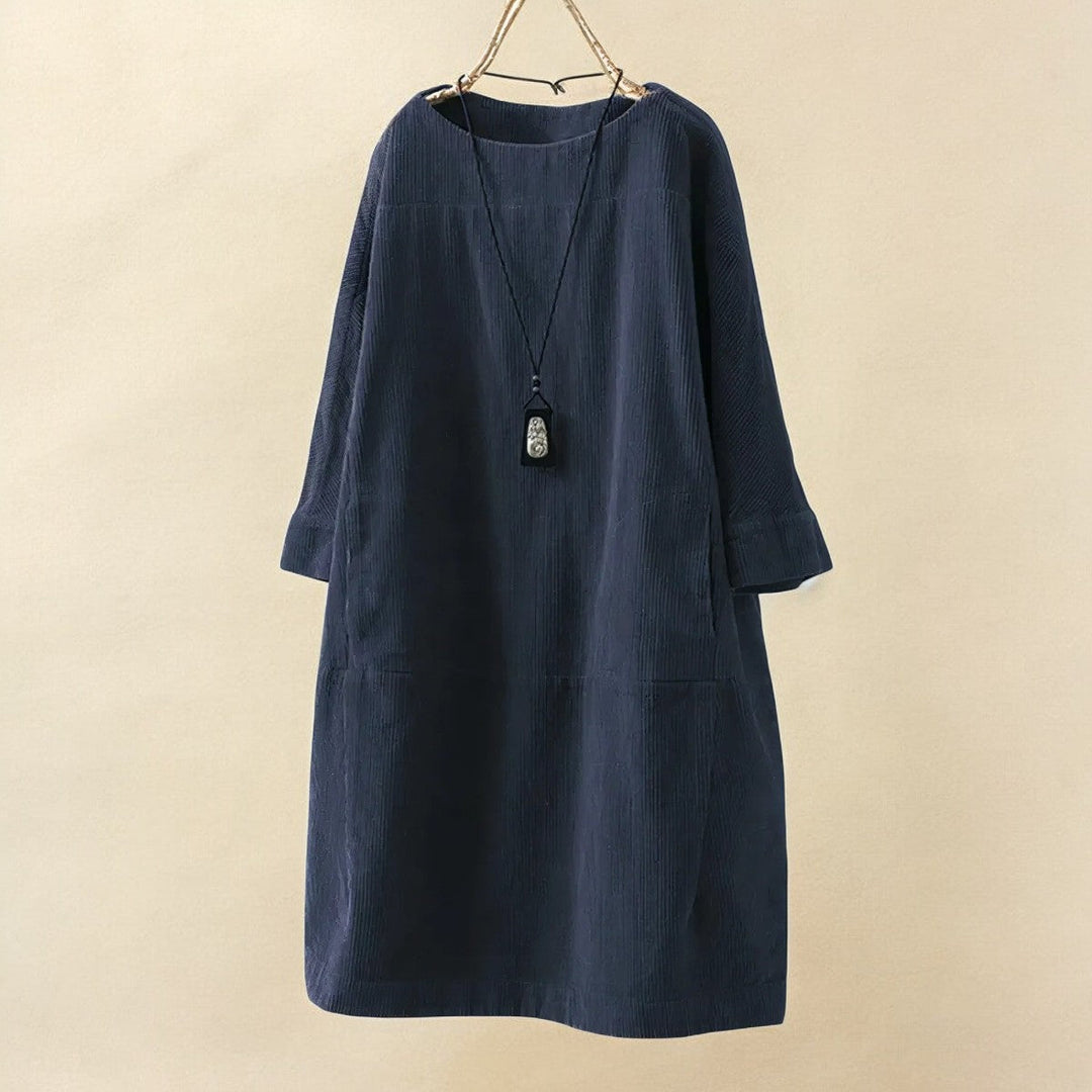 Women's flattering dress, designed with tummy coverage for a smooth, elegant look.