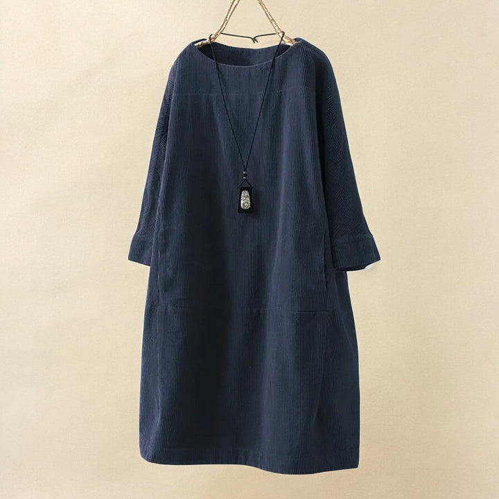 Women's flattering dress, designed with tummy coverage for a smooth, elegant look.
