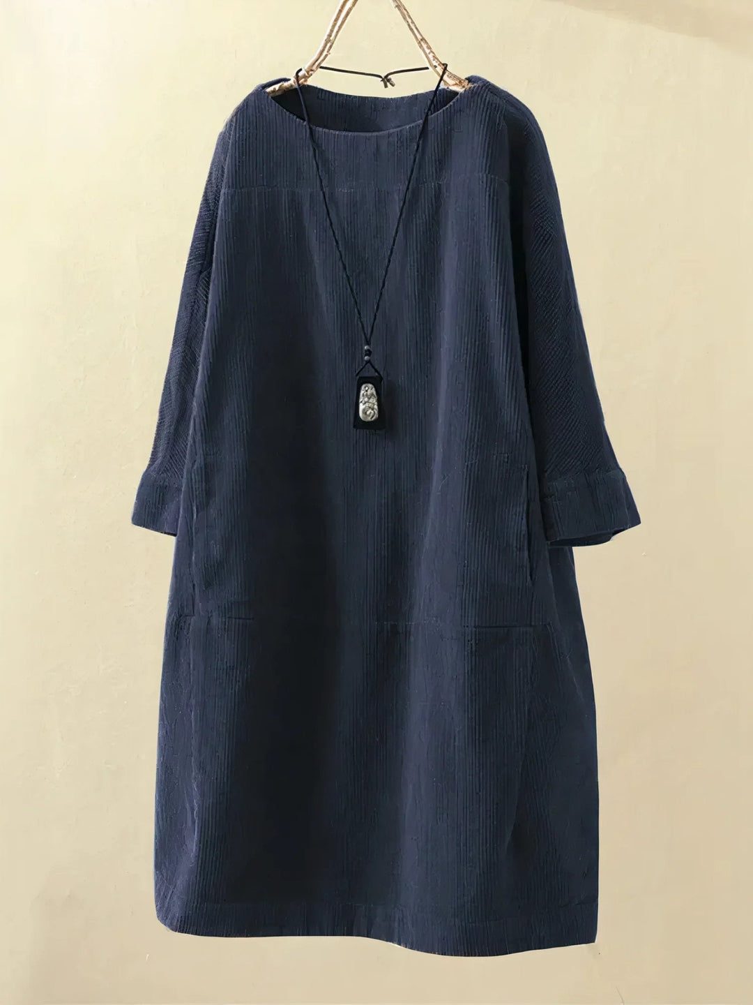 Stylish women's midi dress, comfortable and flattering, with effective tummy coverage.