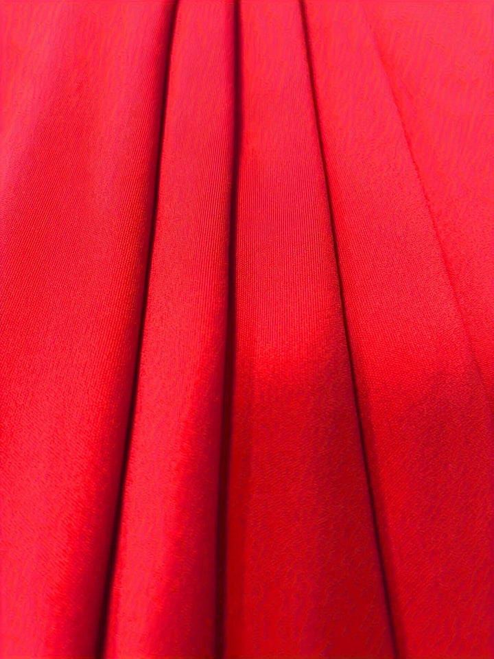Women's elegant midi dress with a flattering v-neck, perfect for formal events & date night.