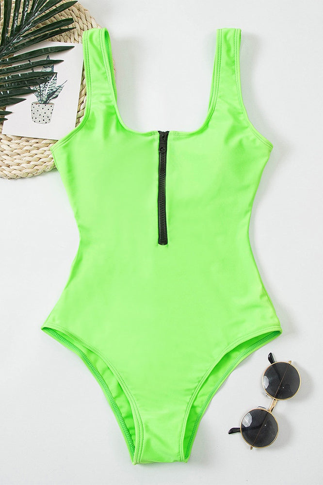 Stylish V-neck zipper one-piece swimsuit for women. Modern beachwear, a flattering choice for your vacation.