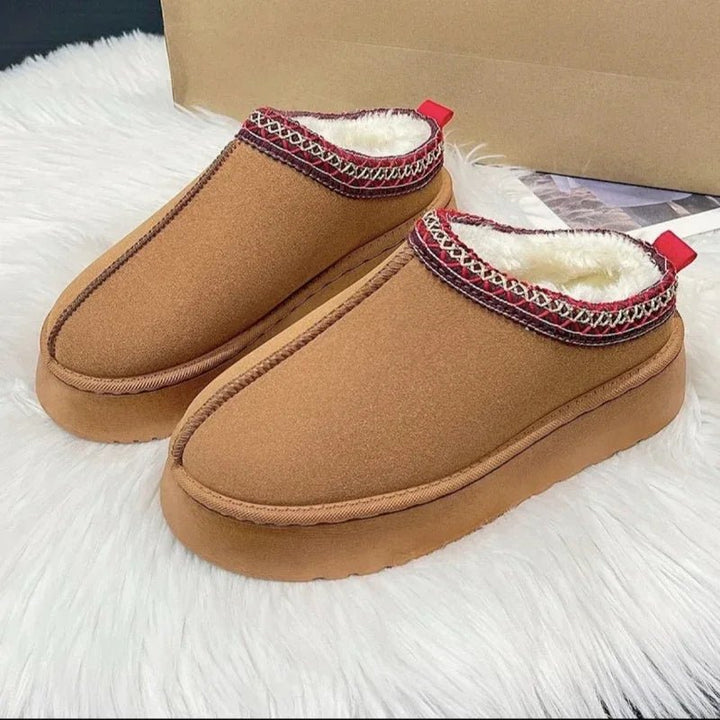 Plush fleece-lined women's slip-on mules offer ultimate comfort & warmth for cold weather and winter.