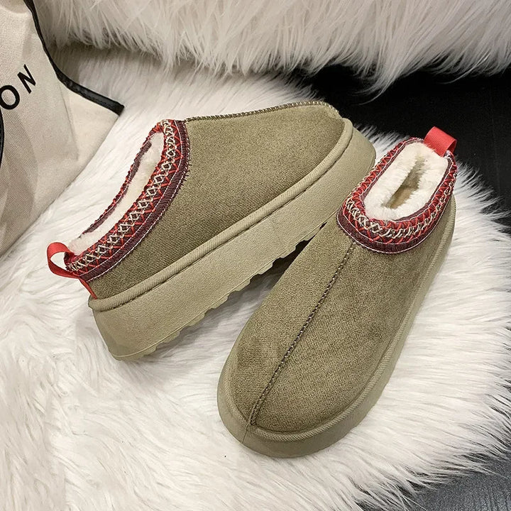 Warm women's mules designed for cold weather; fleece-lined slip-ons provide cozy comfort throughout winter.