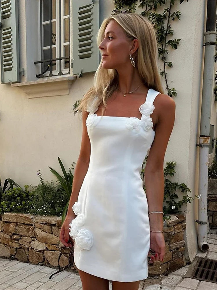 Women's pink floral appliqué mini dress, a stunning summer cocktail & party fashion essential.