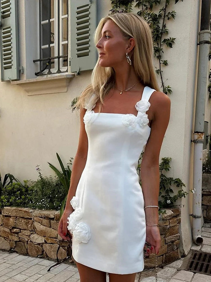 Women's pink floral appliqué mini dress, a stunning summer cocktail & party fashion essential.