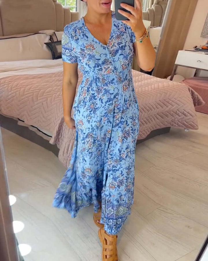 Effortless women's floral boho maxi dress, short sleeve V-neck style, comfortable for summer and beach.