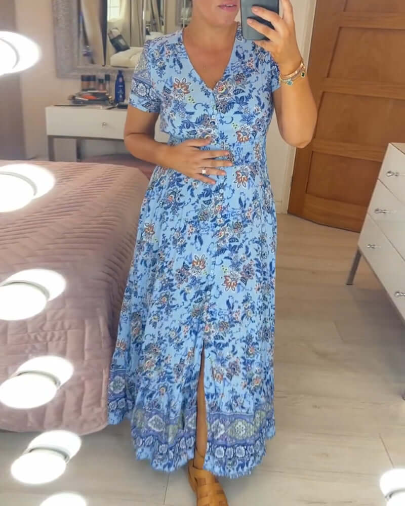 Chic women's bohemian floral maxi dress, V-neck, short sleeve, capturing effortless summer style & comfort.