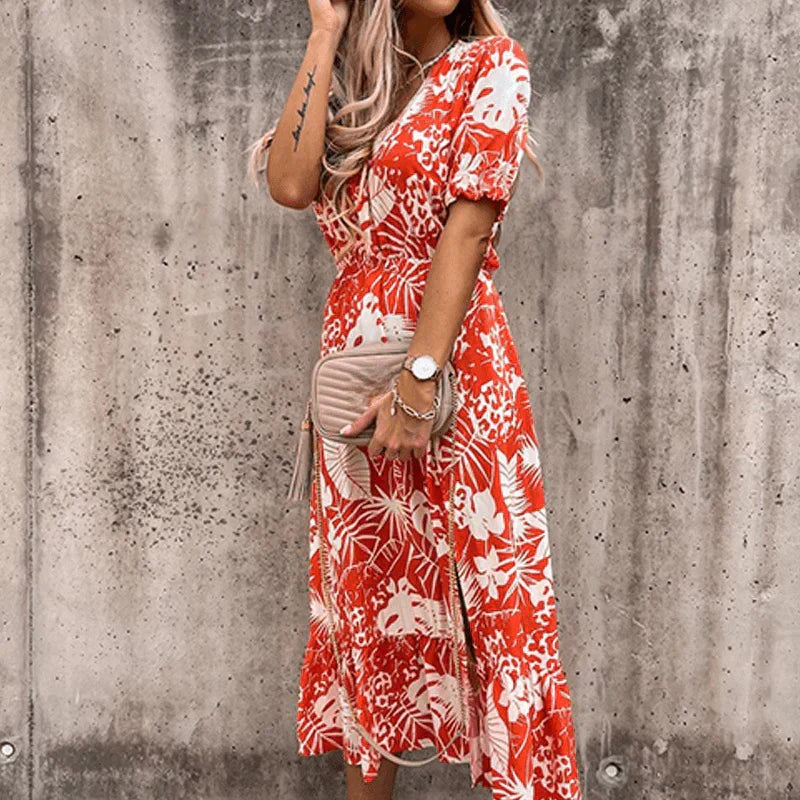 Vibrant floral print maxi dress for women, featuring a practical button-front and trendy side slit, ideal for summer.