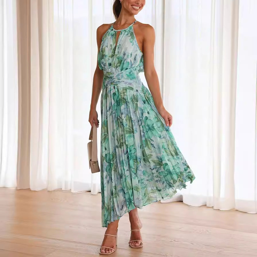 Elegant women's floral halter midi dress with keyhole neckline & pleats. Ideal for summer wedding guests.
