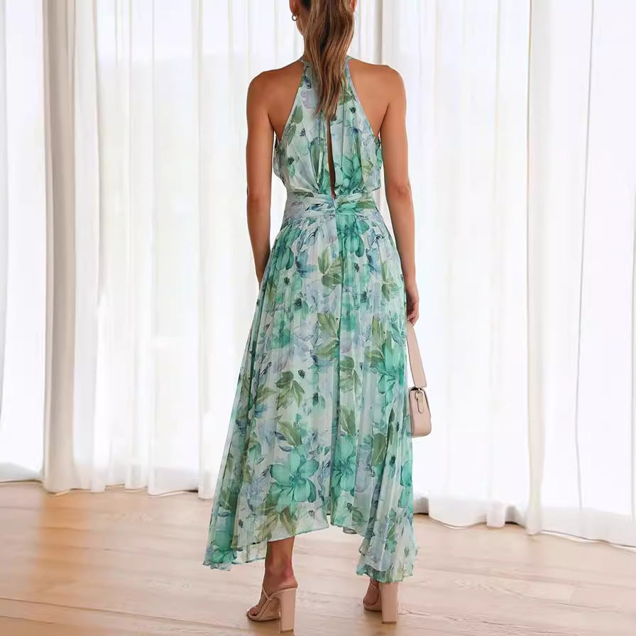 Chic floral print midi dress for women. Halter neck, pleated, perfect party dress for wedding guests in summer.