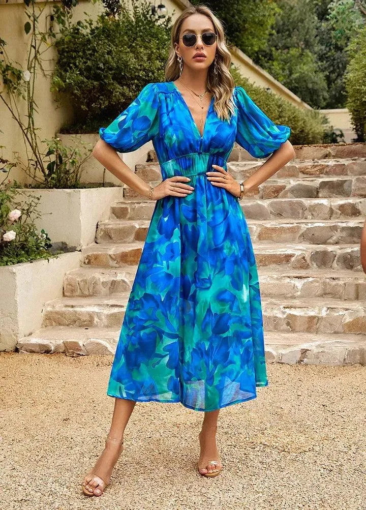 Women's floral midi V-neck dress, perfect for summer parties & elegant race day fashion. Vibrant print, chic attire.