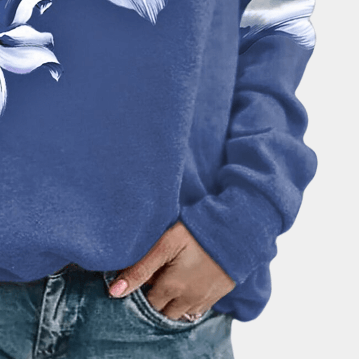 Stylish women's floral print relaxed fit sweatshirt, spring fashion, soft fabric, everyday casual wear.