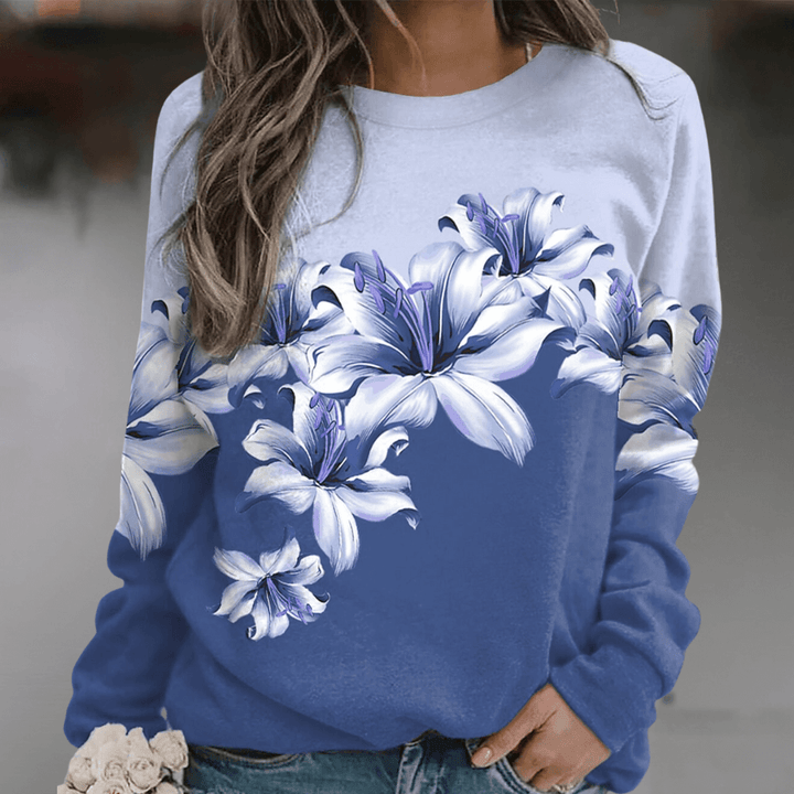 Chic women's floral print relaxed fit sweatshirt, soft fabric, spring casual wear, comfortable everyday top.
