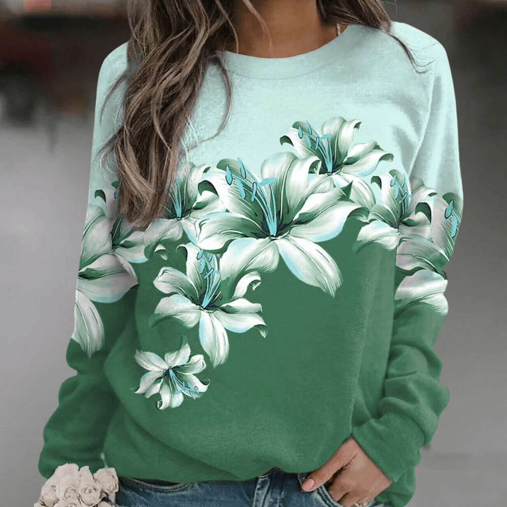 Relaxed fit women's floral print pullover sweatshirt, long sleeve, comfortable casual spring apparel.
