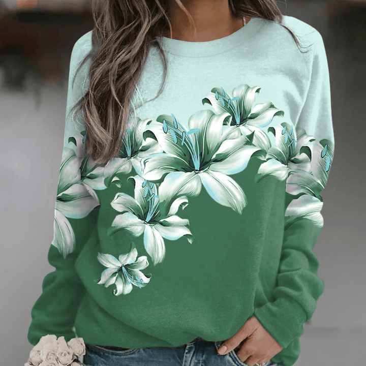 Relaxed fit women's floral print pullover sweatshirt, long sleeve, comfortable casual spring apparel.