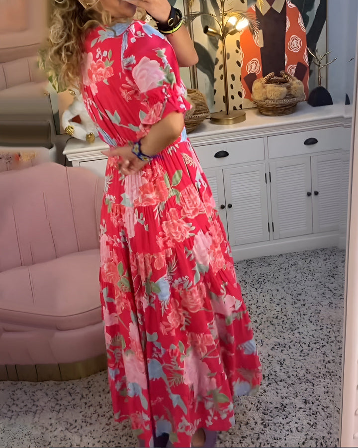 Smiling woman wearing a comfortable, flowy floral V-neck dress with pockets for summer outings.