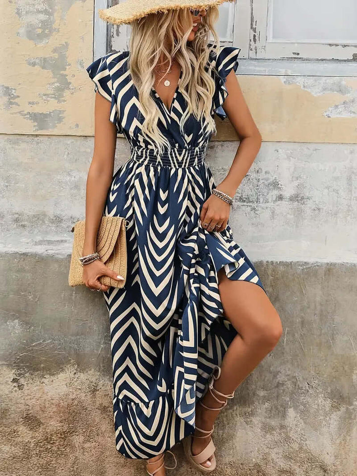 Stylish floral midi dress for women, with a comfortable smocked waist. Versatile polyester design for spring and summer style.