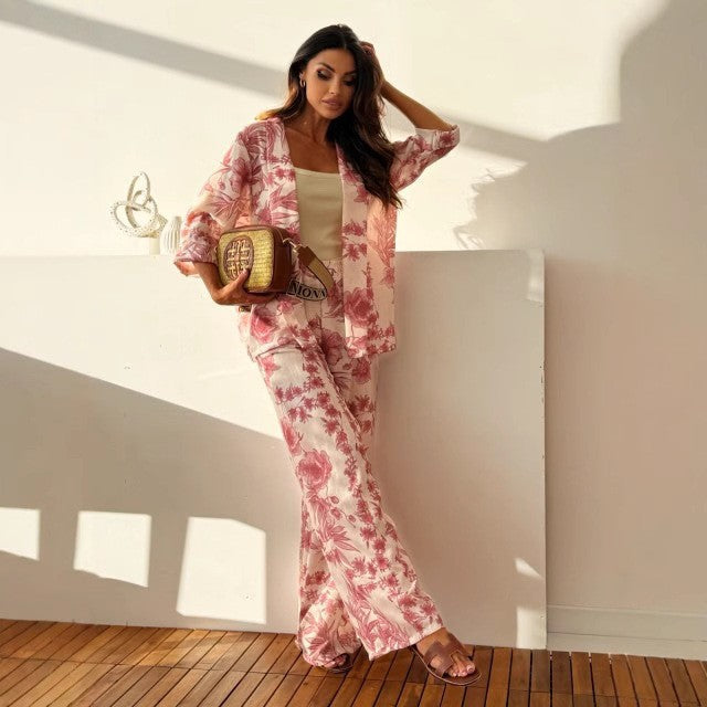 Beautiful floral print women's long sleeve top & wide-leg pants matching set, ideal for spring & summer fashion.