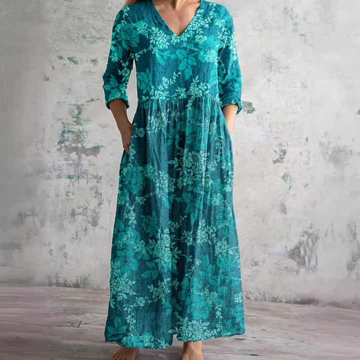 Flattering women's floral V-neck summer dress. Breezy, casual midi style for warm weather comfort.