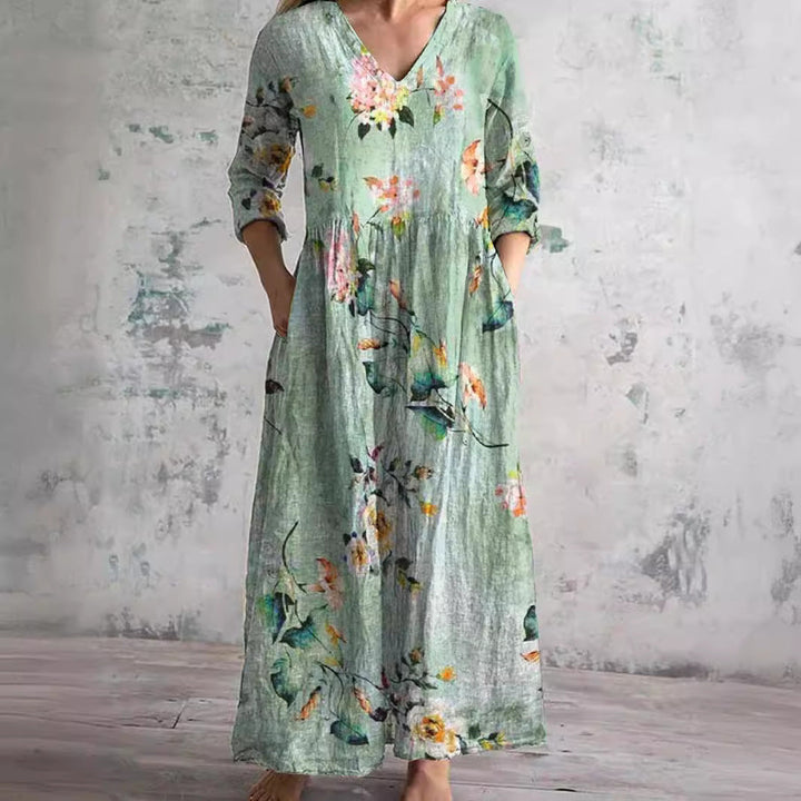 Elegant floral V-neck midi dress for women. Ideal summer casual style, offering breezy comfort and a feminine look.