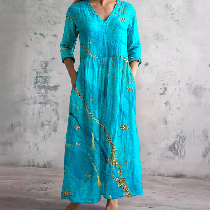 Elegant women's floral V-neck midi dress, perfect for summer. Feminine and comfortable warm weather style.