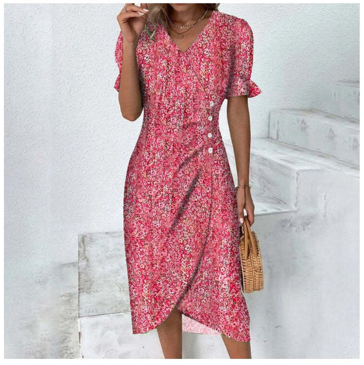 Chic women's floral midi wrap dress with a sophisticated V-neck and fashionable puff sleeves for spring.
