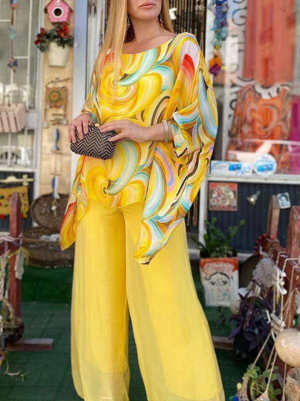 Fashionable women's flowing chiffon two-piece set, an elegant & versatile summer outfit choice.