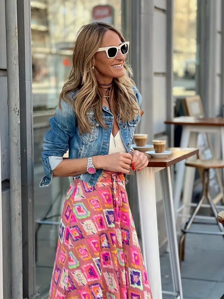 Printed boho tiered maxi skirt for women, showcasing effortless long flowing style for warm weather.