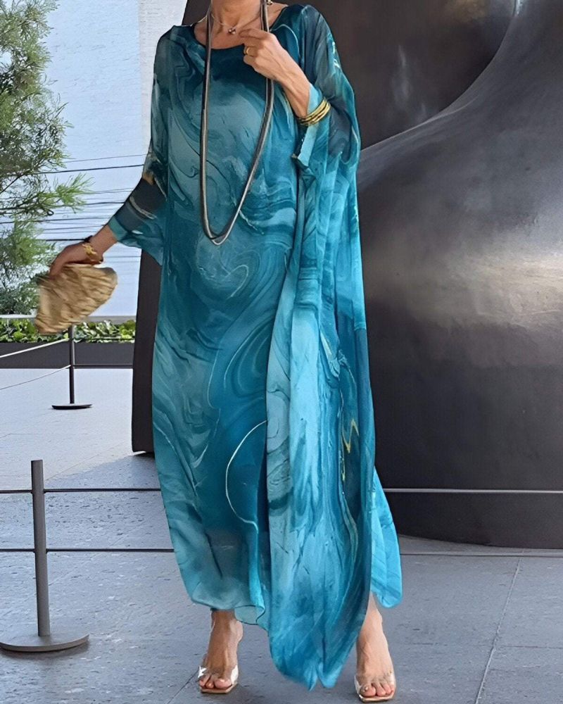 Women's flowy elegant maxi dress, perfect for special occasions, parties, or evening events.