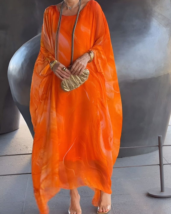 Elegant flowy maxi dress for women, ideal for holiday celebrations, special events, and formal parties.