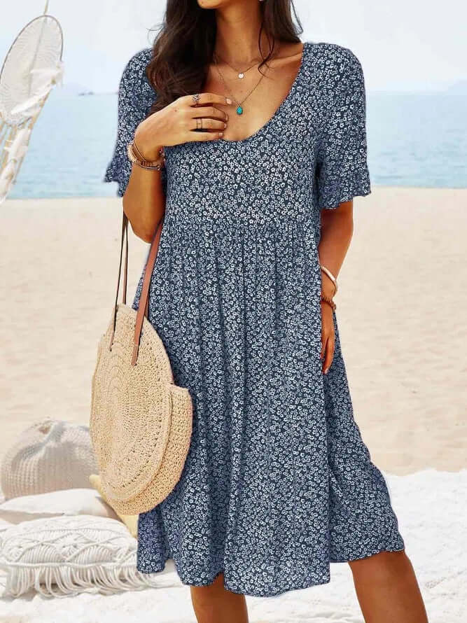 Comfortable women's floral midi dress with a relaxed, flowy fit, ideal for spring & summer everyday wear.