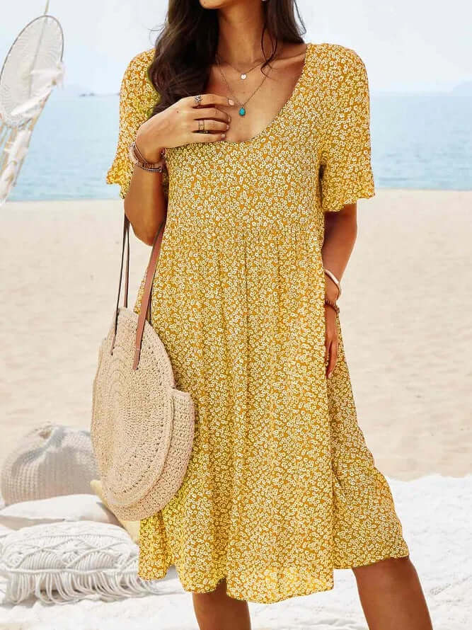 Elegant floral print midi dress for women, short sleeve, V-neck, a stylish choice for summer parties.