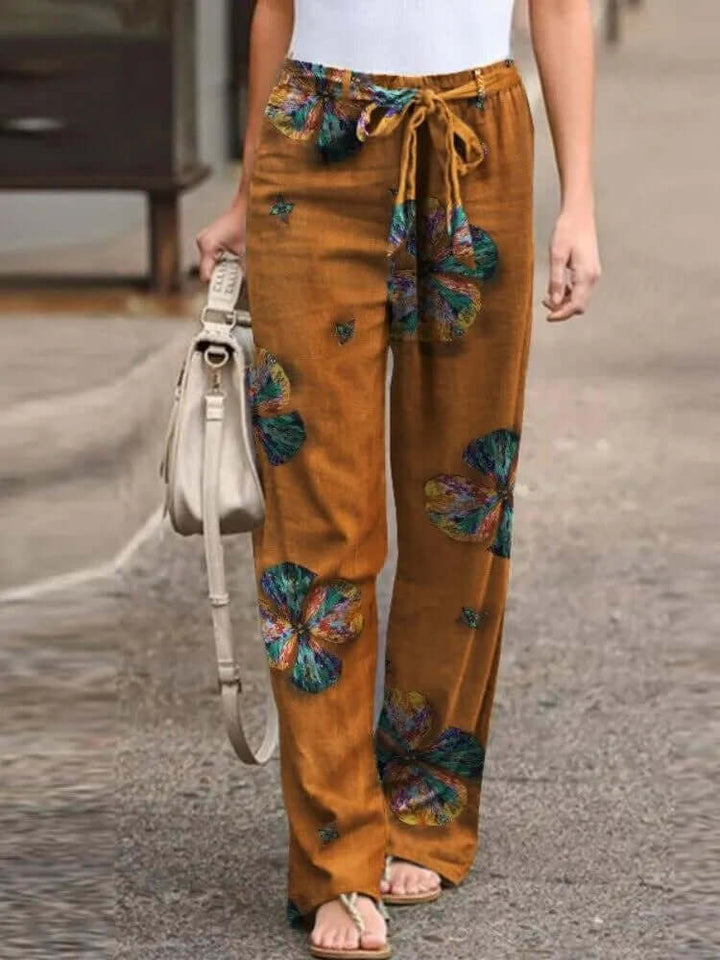 Chic floral wide-leg pants for women, offering a flowy, breezy feel. Ideal for summer casual and comfort.